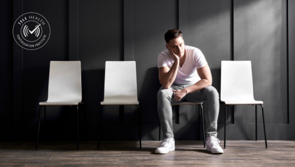 man sitting alone in waiting room